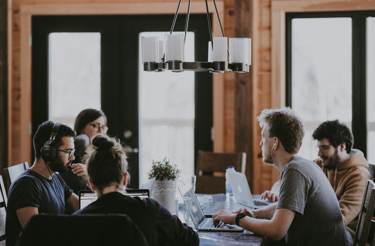Colleagues reviewing notes during a financial planning conversation
